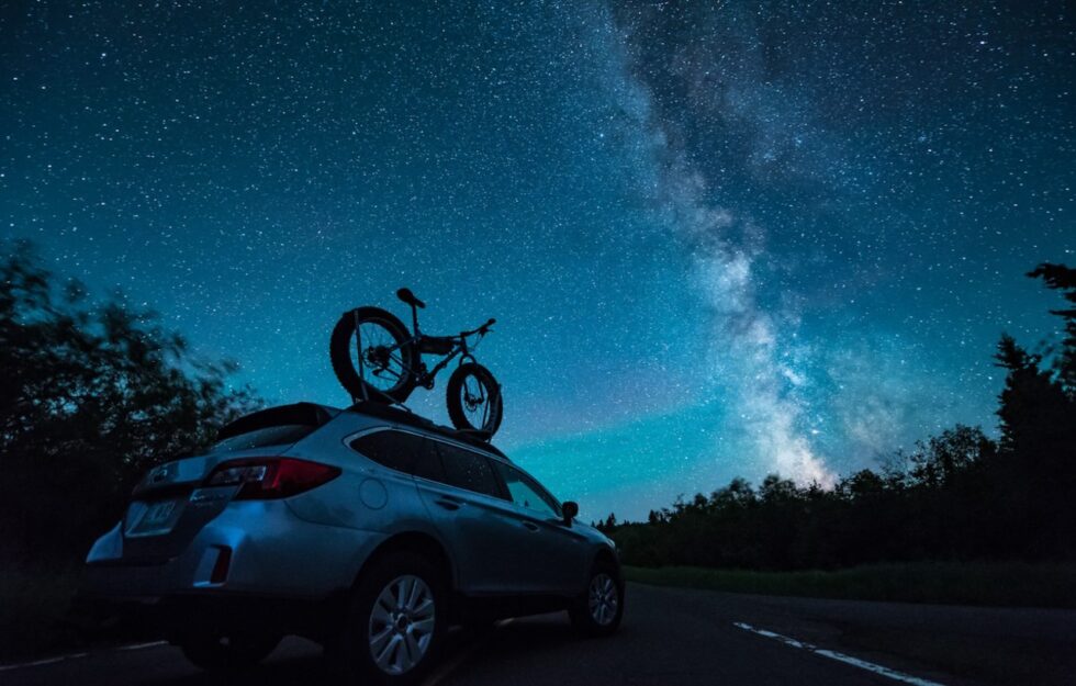 starry sky with car and bike
