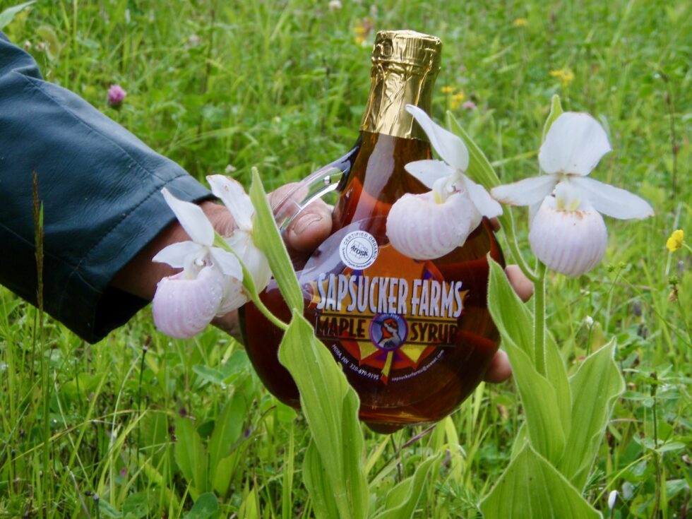 maple syrup bottle with lady slipper orchids